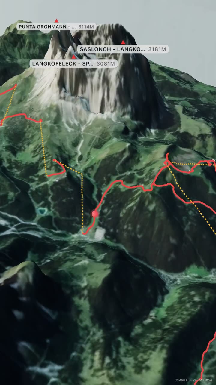 A Tracely flyover: the red route line of a day on the slopes winds past the Sassolungo in the Dolomites, with peak and village labels.